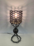 Kettenlampe Chain Glow über Esstisch
